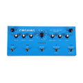 Blue audio effect pedal with multiple knobs, toggle switches, and input/output jacks labeled Cosmos Drifting Memory Station.