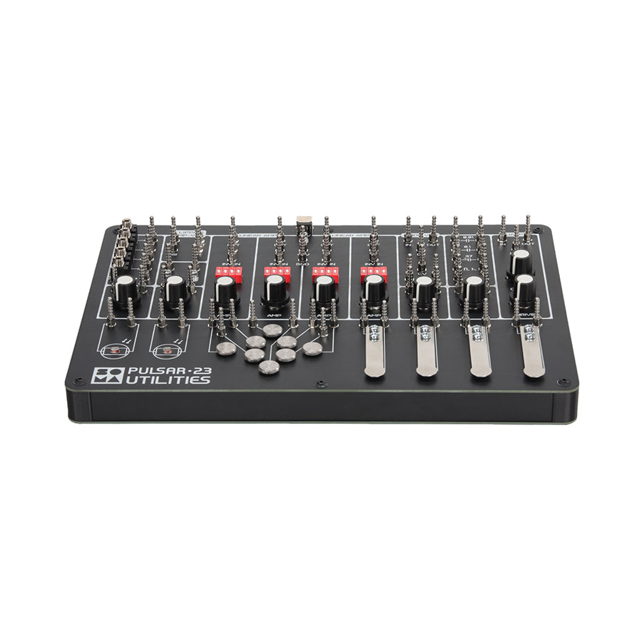 Black control panel with multiple spring terminal connectors, rotary knobs, toggle levers, and red switches labeled Pulsar-23 Utilities.