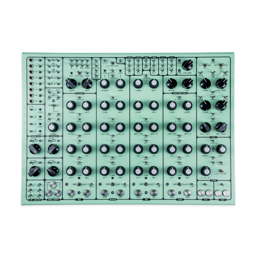 Top view of a mint green audio device with multiple knobs, switches, and 1/4 inch jacks arranged on the front panel.