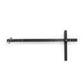 Black stringed musical instrument with tuner knobs and audio jack on a wooden crossbar base.