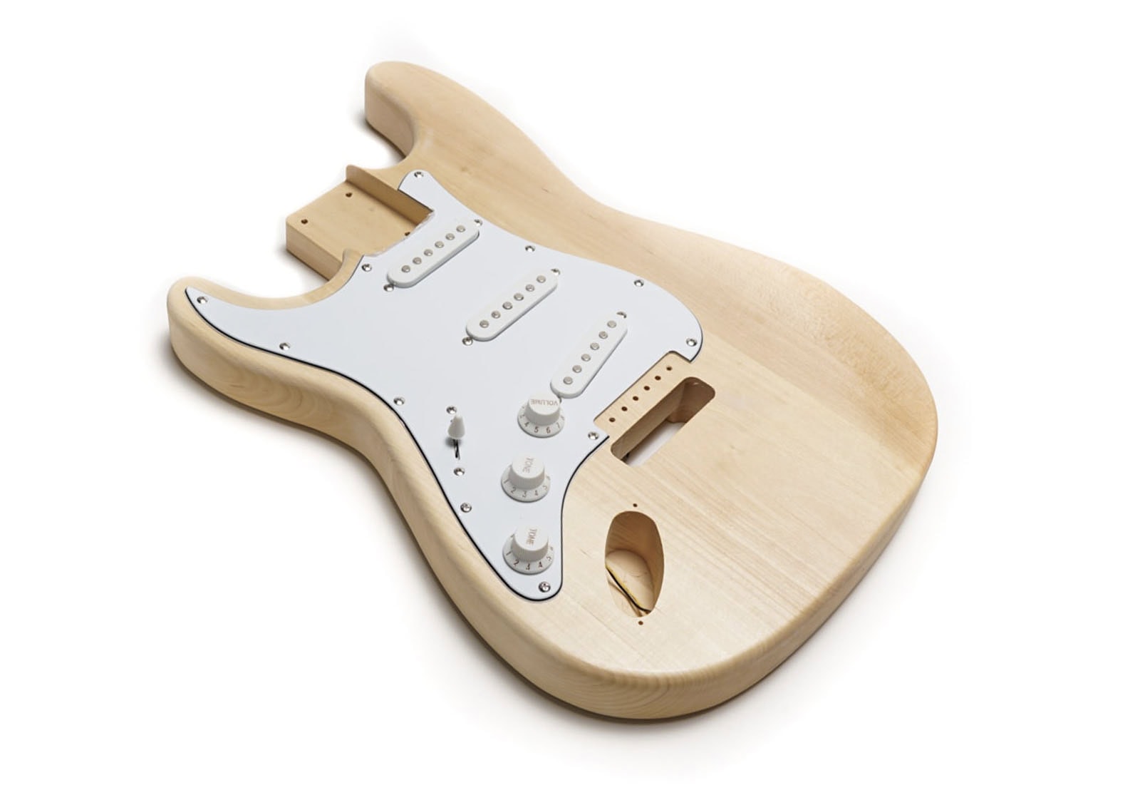 Natural wood electric guitar body with white pickguard, three pickups, three control knobs, and a toggle switch.