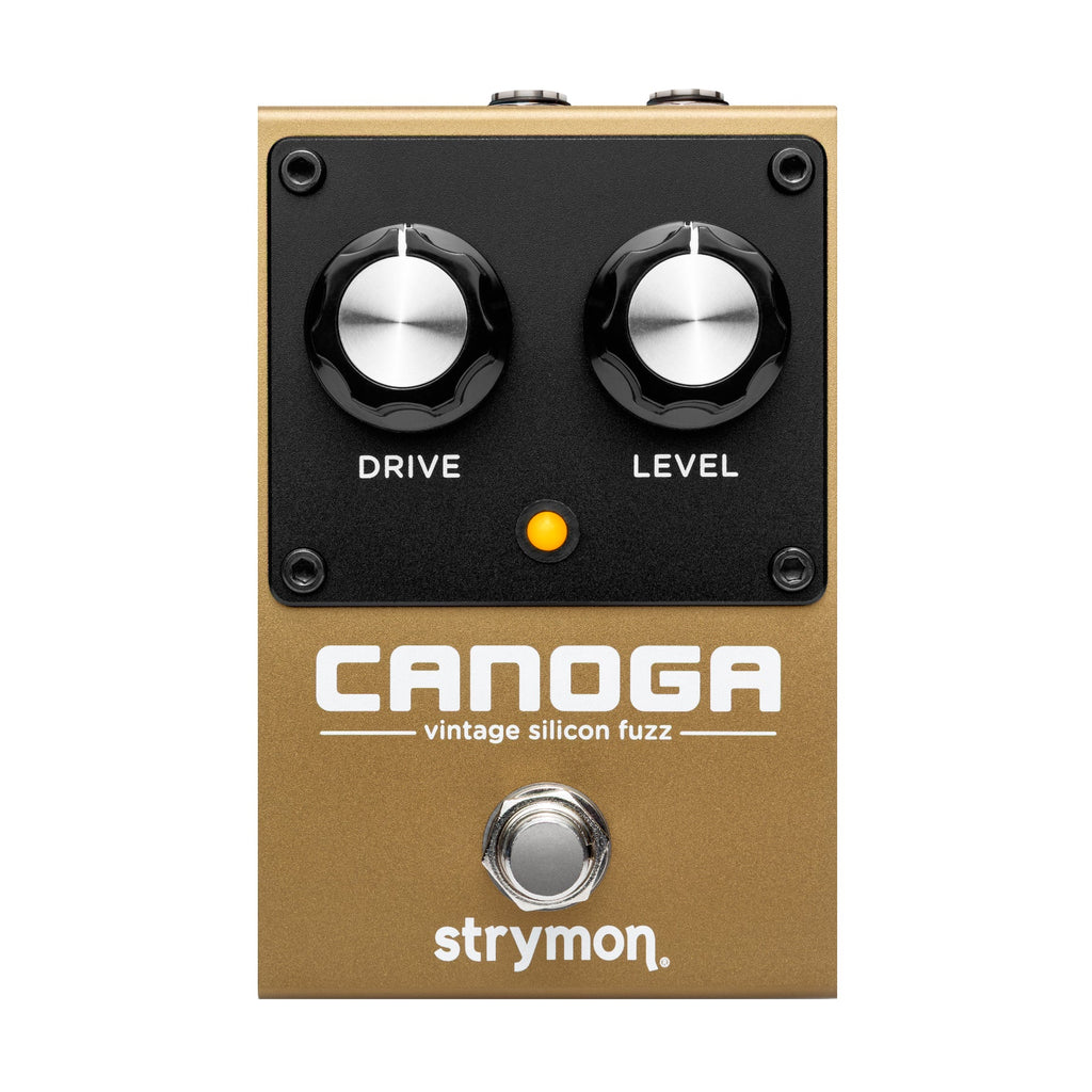 Gold-colored guitar effects pedal with two knobs labeled Drive and Level and a footswitch.