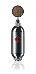 Silver and black microphone with a round mesh head and red logo on the body, standing vertically on a reflective surface.