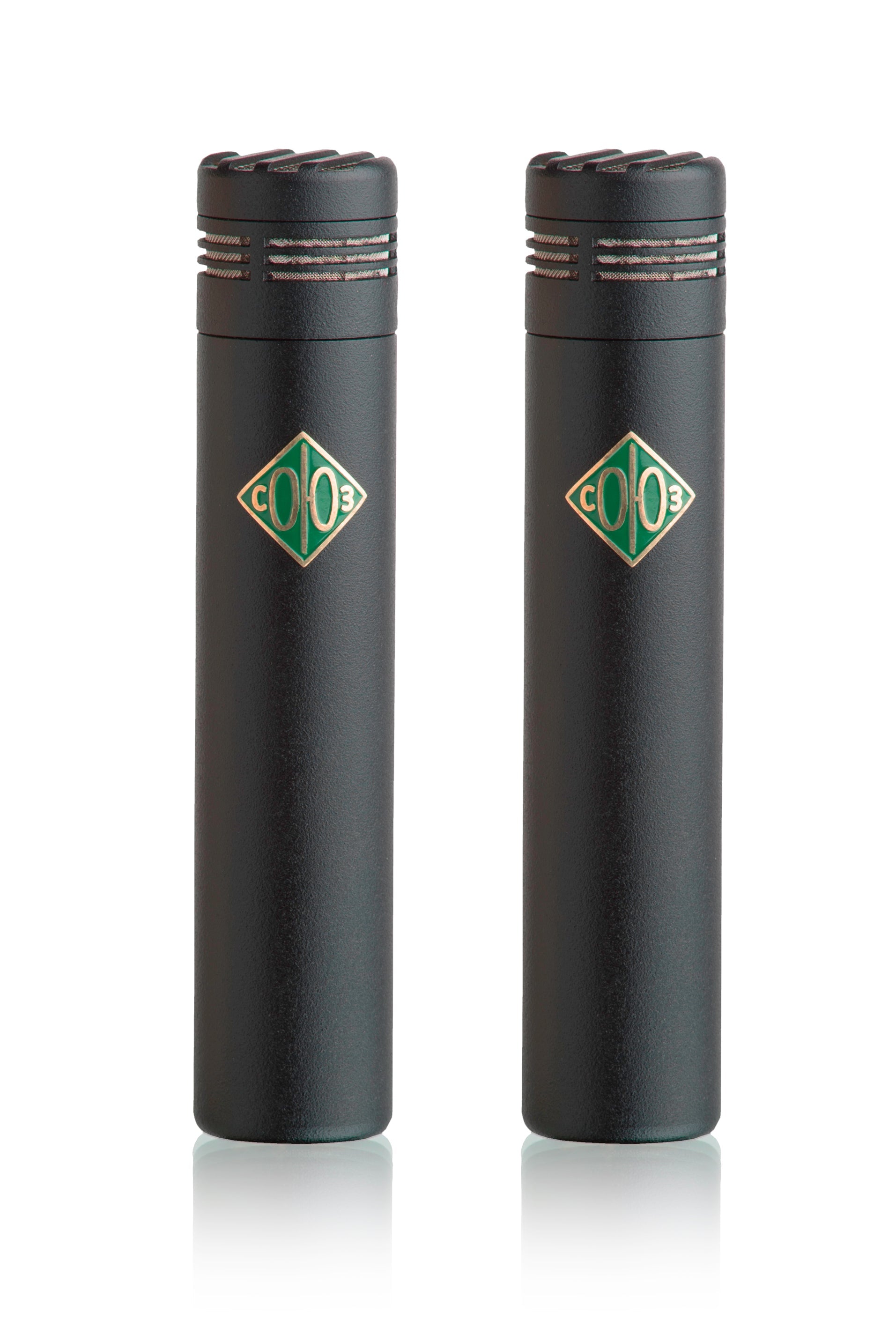 Two black cylindrical microphones with a green and gold diamond-shaped logo side by side on a white background.