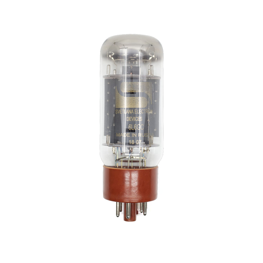 Clear glass vacuum tube with brown multi-pin base labeled Svetlana 6L6GC made in Russia.