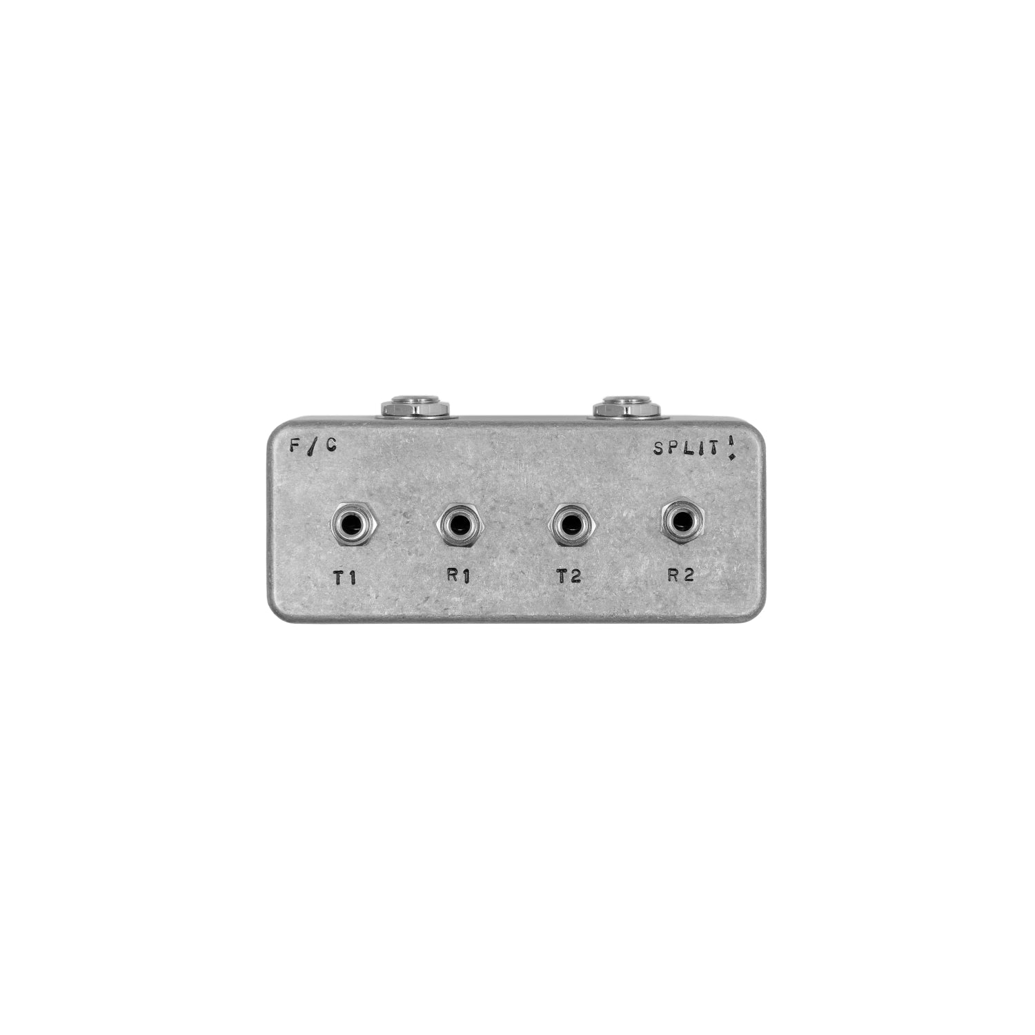 Small metal audio splitter box with four 1/4 inch jack sockets labeled T1, R1, T2, R2 and text F / C and SPLIT!