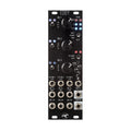 Black eurorack module with multiple jacks, knobs, toggle switches, and LED indicators labeled Eddy