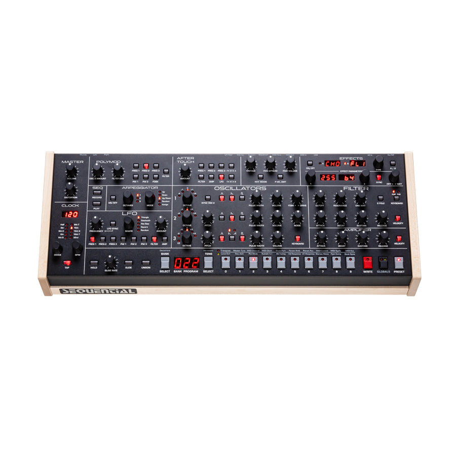 Black desktop synthesizer with multiple knobs, buttons, and red digital displays on a white background.