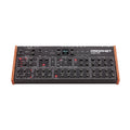 Black Sequential Prophet Rev2 synthesizer with wooden side panels and multiple knobs and buttons on top panel