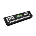 Black rack-mounted sequencer with multiple white buttons, rotary knobs, and a color display screen showing graphic visuals.