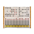 White and wood eurorack module with knobs, jack sockets, and a touch activated keyboard sequencer panel.