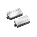 Two silver metallic humbucker pickups with black bases and Fishman branding on a white background.