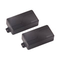 Two black rectangular guitar pickups with mounting tabs, each marked with FISHMAN logo.