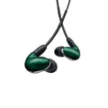 Green and black in-ear earphones with cords and Shure branding on each earpiece.
