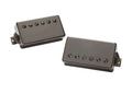 Two black nickel guitar humbucker pickups with six adjustable pole screws each.
