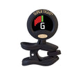 Black clip-on tuner displaying note G with a red and green LED meter on screen
