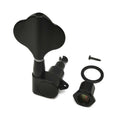 Black bass guitar tuner peg with mounting screw, washer, and bushing on a white background.