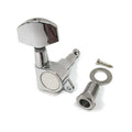 Chrome guitar tuner peg with accompanying washer, screw, and bushing on white background.