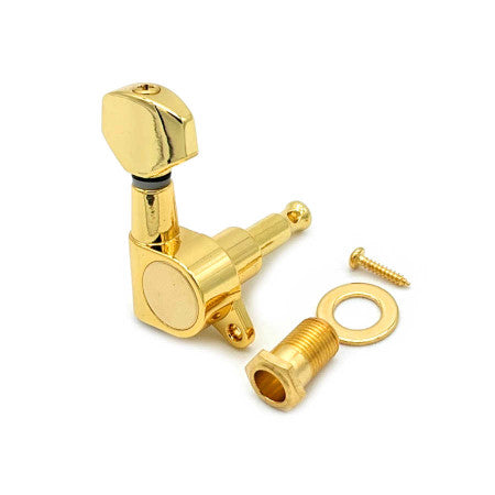 Gold-colored guitar tuning machine with screw, washer, and bushing laid out on white background.