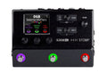 Top view of a black multi-effects pedal with color-coded footswitches and a color display screen showing effect names.
