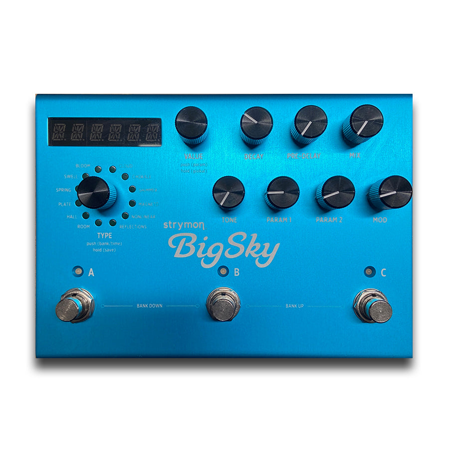 Blue guitar effects pedal with multiple control knobs, rotary selector, footswitches, and digital display.