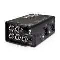 Black audio interface box with 1/4 inch jacks, XLR outputs, knob, switches, and 9V power input.