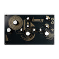 Black Synthux Academy Audrey II synth module with white knobs and gold graphic design.