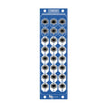 Blue eurorack module with 18 3.5mm audio jacks arranged in six rows and three columns.