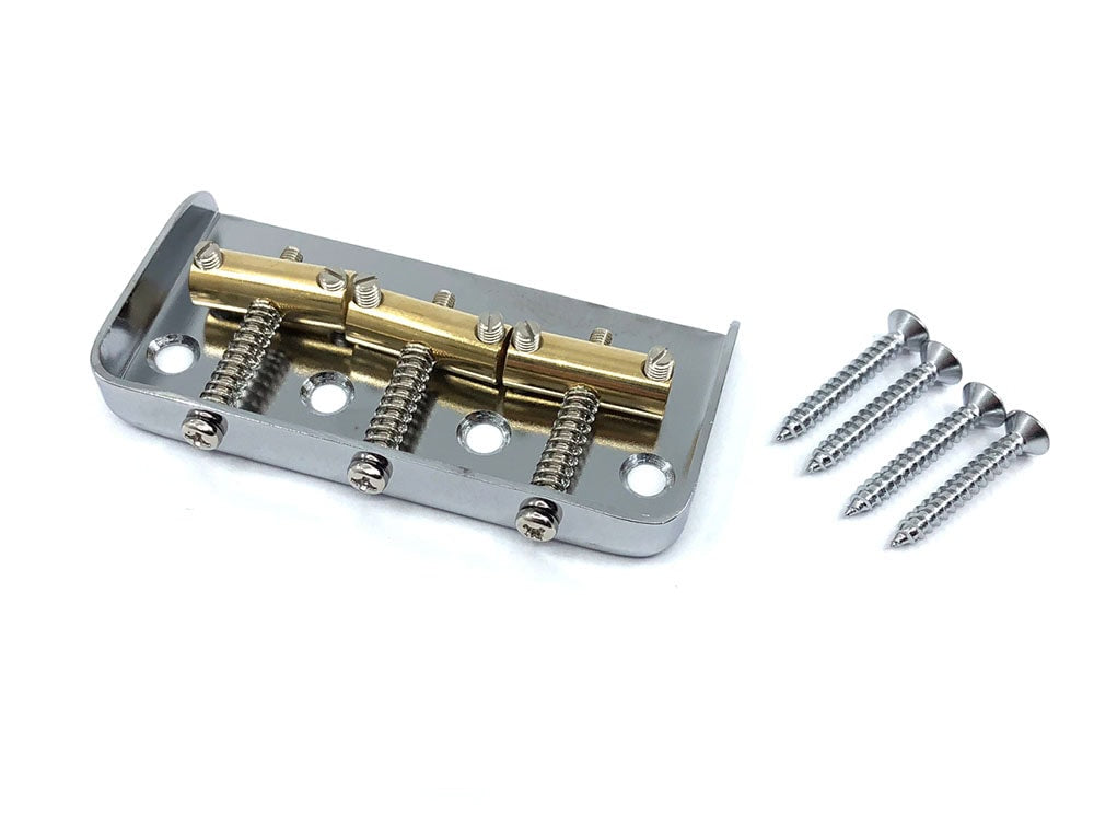 Silver metal bridge baseplate with gold saddles and four mounting screws on a white background.