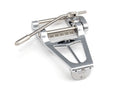 Silver metal tremolo unit with adjustable arm and knurled knob, featuring a logo with a letter D