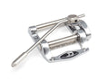 Silver metal tremolo device with an arm and a black logo plate on a white background.