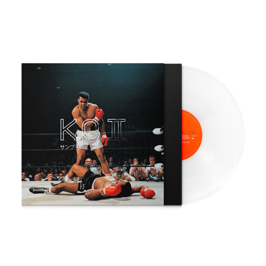 Clear vinyl record with orange label partially outside a record sleeve featuring a boxing match image.