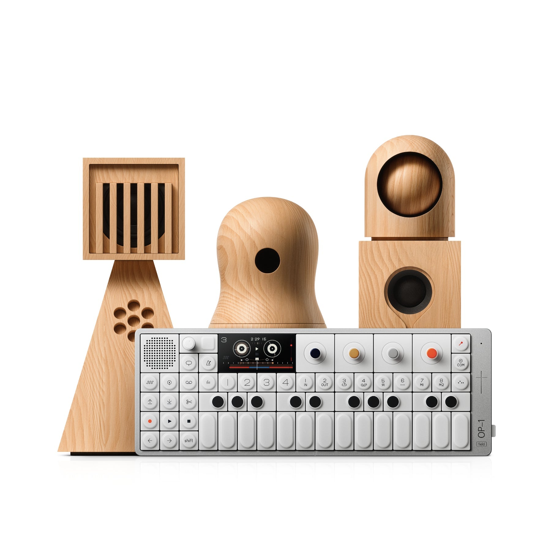 Compact white and silver portable synthesizer with display, buttons, knobs, and three wooden speaker units behind it