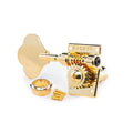 Gold bass guitar tuning key with a large post, screws, and a ring bushing on a white background.
