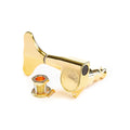 Gold-colored rotary tuning key with mounting bushing and screw on white background.