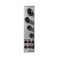 Silver eurorack module with four black knobs and six 3.5mm jack connectors labeled for frequency, drive, VCA, and input/output.