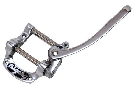 Silver metal vibrato tailpiece with a lever arm and 'Bigsby' logo on the base plate.