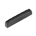 Black slotted guitar nut with five string slots and engraved text on the side.