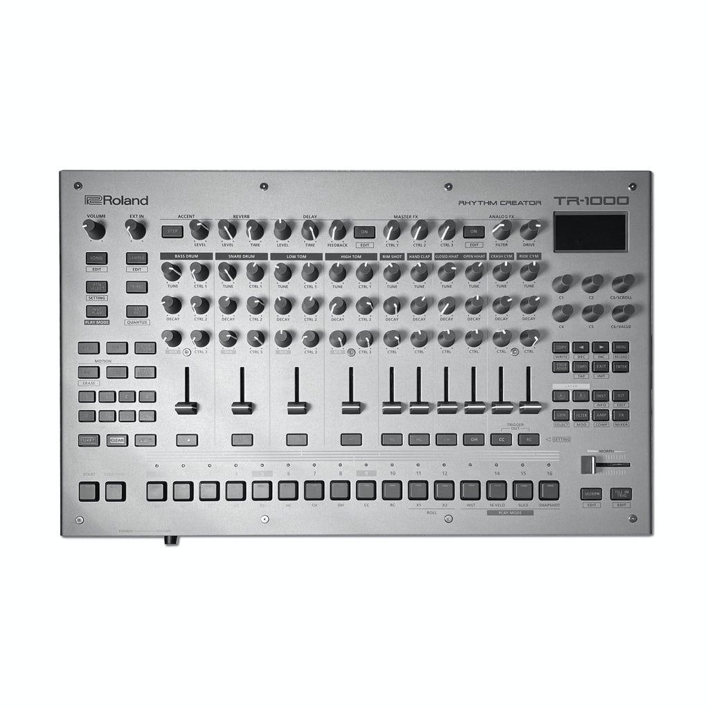 Front top view of a silver Roland TR-1000 drum machine with knobs, sliders, buttons, and a small display screen.