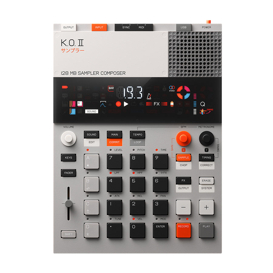 Top view of a K.O. II 128 MB sampler composer showing its display, buttons, knobs, fader, and connectors.