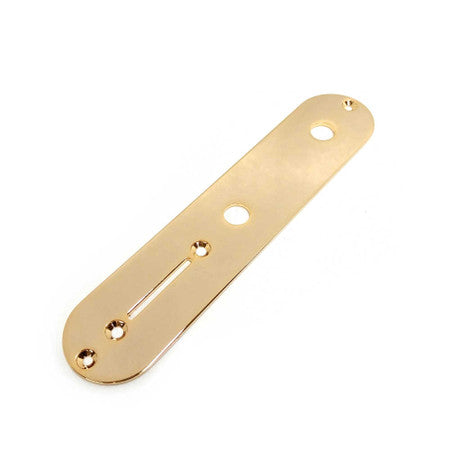 Gold-colored metal control plate with mounting holes and a slot for a switch.