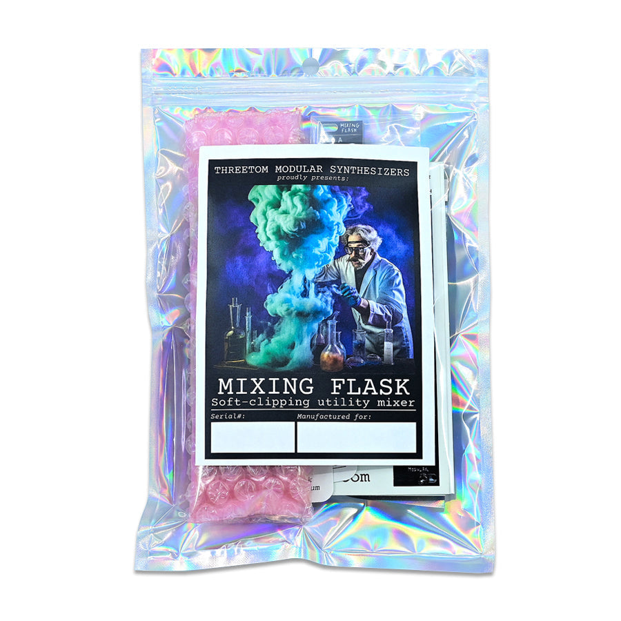Sealed holographic bag containing a DIY kit labeled Mixing Flask with an instruction sheet showing colorful smoke and a person in lab coat.