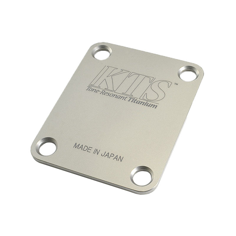 Silver rectangular 4-hole metal plate with KTS and Made in Japan text on its surface.