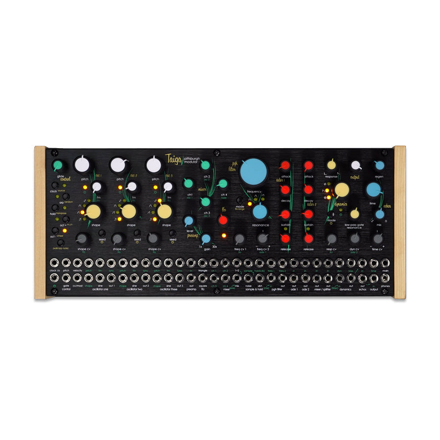 Front view of a black Pittsburgh Modular Taiga Desktop synthesizer with multiple knobs, sliders, and patch jacks.