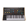 Black synthesizer keyboard with wooden sides and multiple colorful knobs and patch jacks on the control panel.