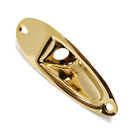 Gold metallic jack plate with two mounting holes photographed from an angled top view.