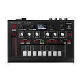 Top view of a black Pioneer DJ Toraiz AS-1 analog synthesizer with knobs, buttons, and a small display screen.