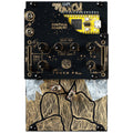 Black and gold audio effects module with knobs, sliders, toggle switches, audio jacks, and a micro USB port.