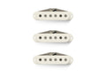 Three off-white single coil guitar pickups with exposed pole pieces arranged vertically on a white background.