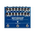 Blue overdrive pedal with multiple knobs, toggle switches, and footswitches labeled with controls for volume, gain, and tone.